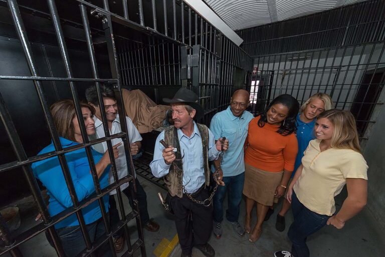 guests and guide inside the Old Jail