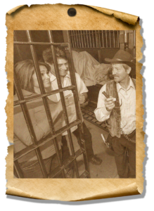 parchment and image of couple and guard at old jail