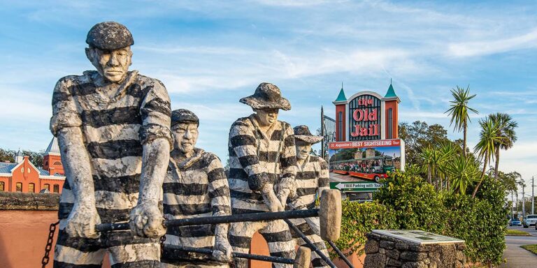 life-size sculpture of Old Jail prisoners working