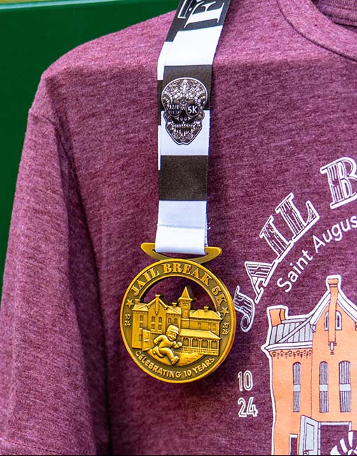 Jail Break 2026 race shirt and medal